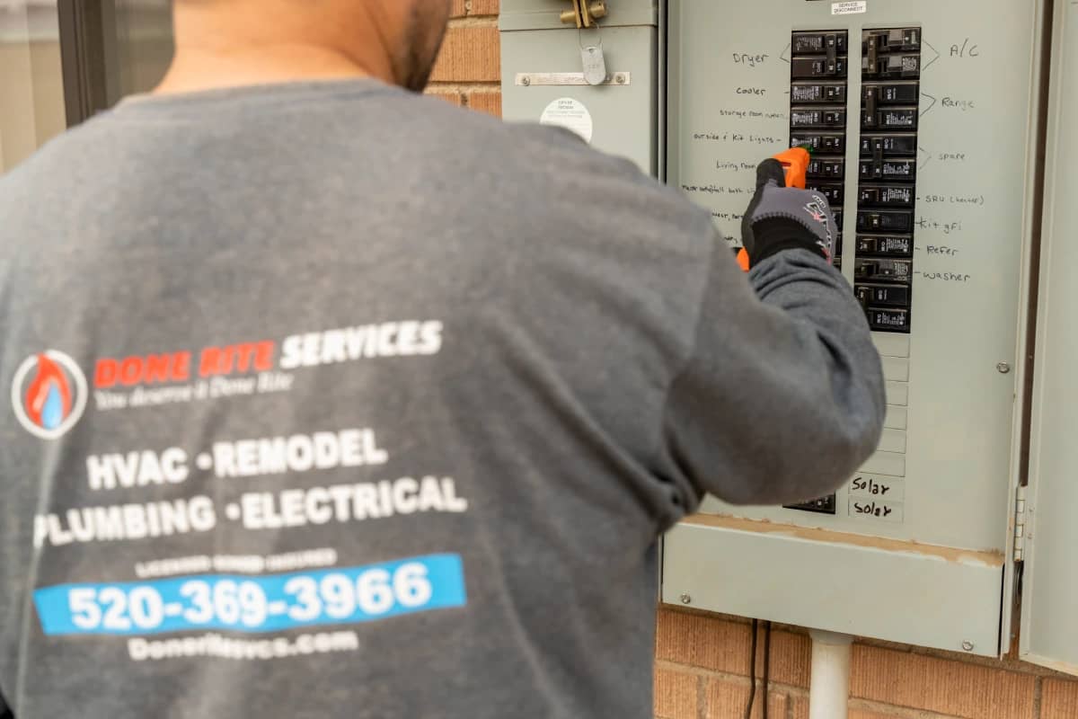 Done Rite technician working on service panels in Tucson, AZ