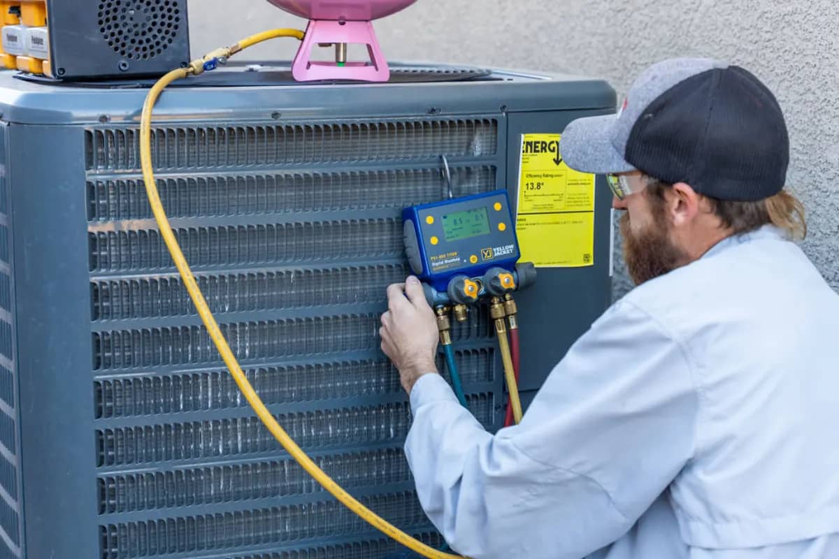 Done Rite HVAC professional testing refrigerant for AC repair in Tucson
