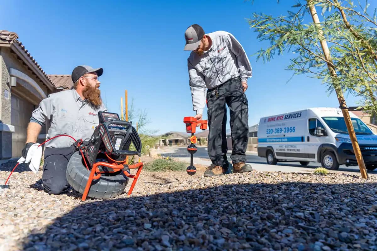 Tucson plumbers from Done Rite Services are planning a job for sewer line replacement