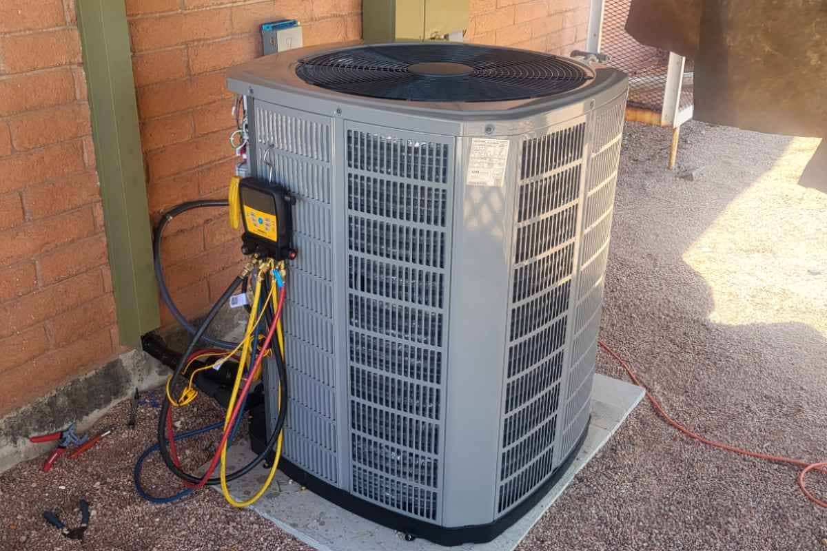Residential air conditioner compressor installed outside by Done Rite Service, enhancing cooling efficiency and home comfort.
