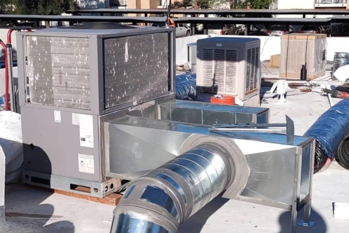 Rooftop commercial heat pump units serviced by Done Rite Service, optimized for large building energy management.