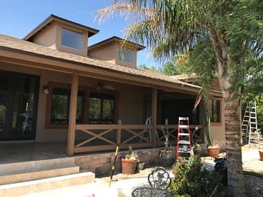 Commercial building in the process of synthetic stucco restoration and installation in tucson, az