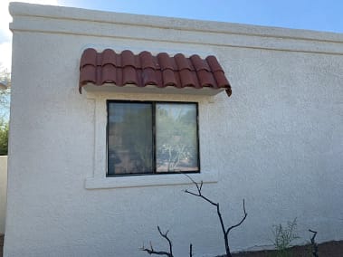 Exterior view of a residential property after completing stucco repair by sunset coatings stucco & paint