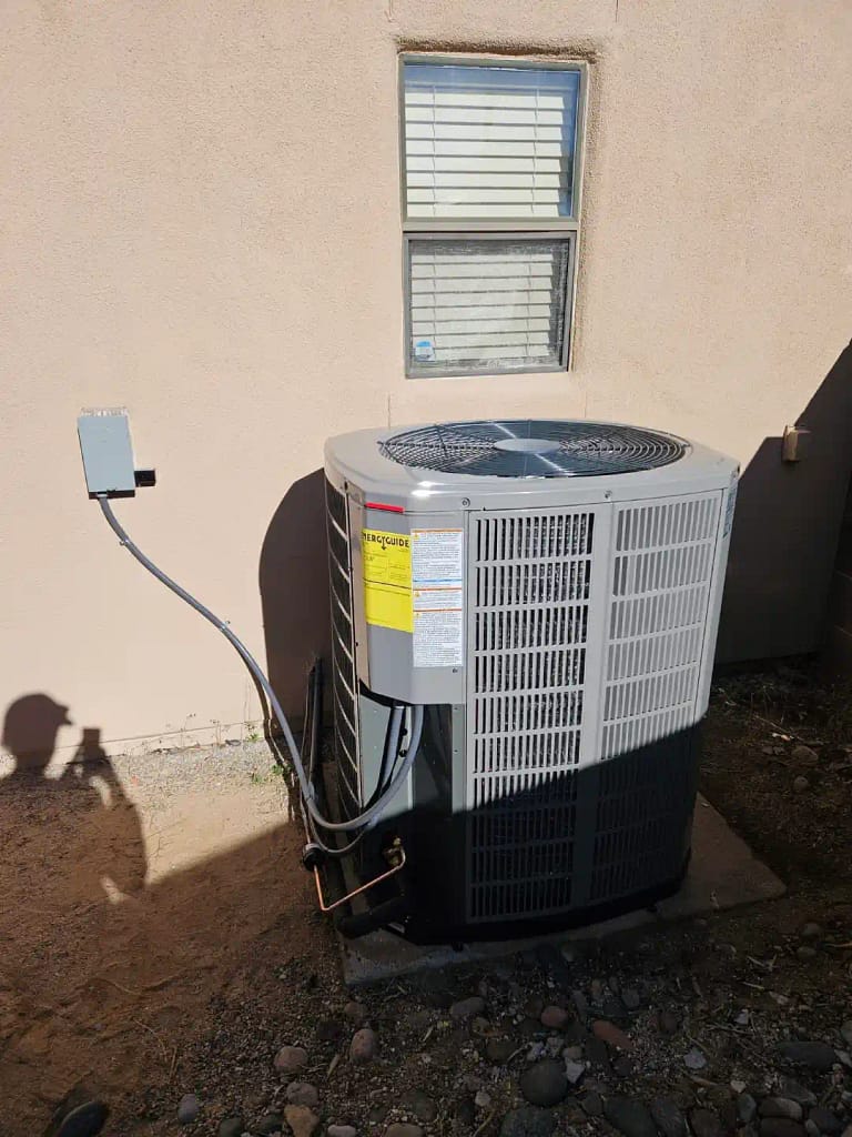 Single Stage vs Two Stage Air Conditioners - Image of Air Conditioner Installation Compressor Outdoor